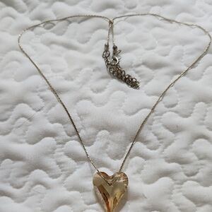 Gold Heart Pendant Necklace with Elegant Design